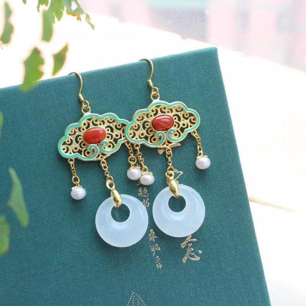 Natural Hetian  jade hollow tassel earrings