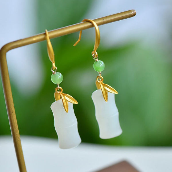 Ancient gold craftsmanship inlaid natural Hetian white jade bamboo leaf ladies earrings