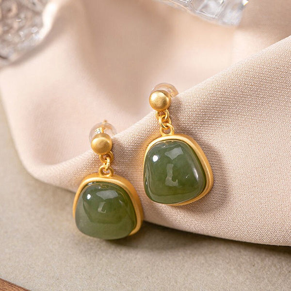 Creative design inlaid Hetian chalcedony oval earrings