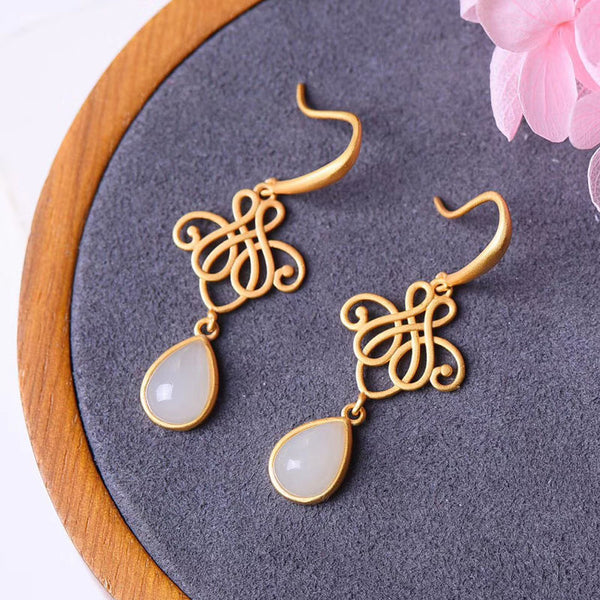 Silver inlaid natural Hetian chalcedony water drop earrings