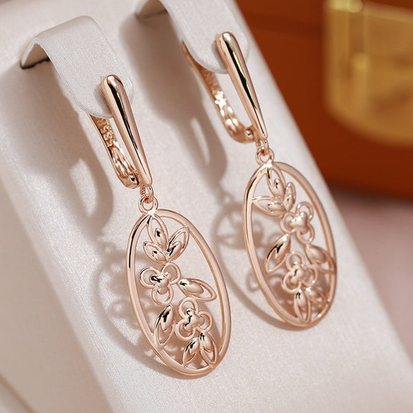 Personality Hollow Flower Oval Pendant Earrings for Women