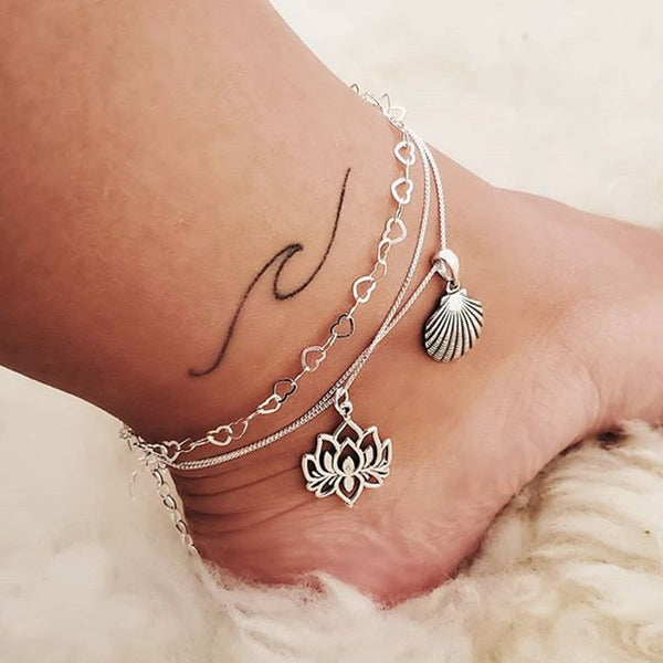 pack of 2 beach anklets with shell and lotus pendant